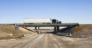 Trucker on bridge renewing his ifta license for 2020